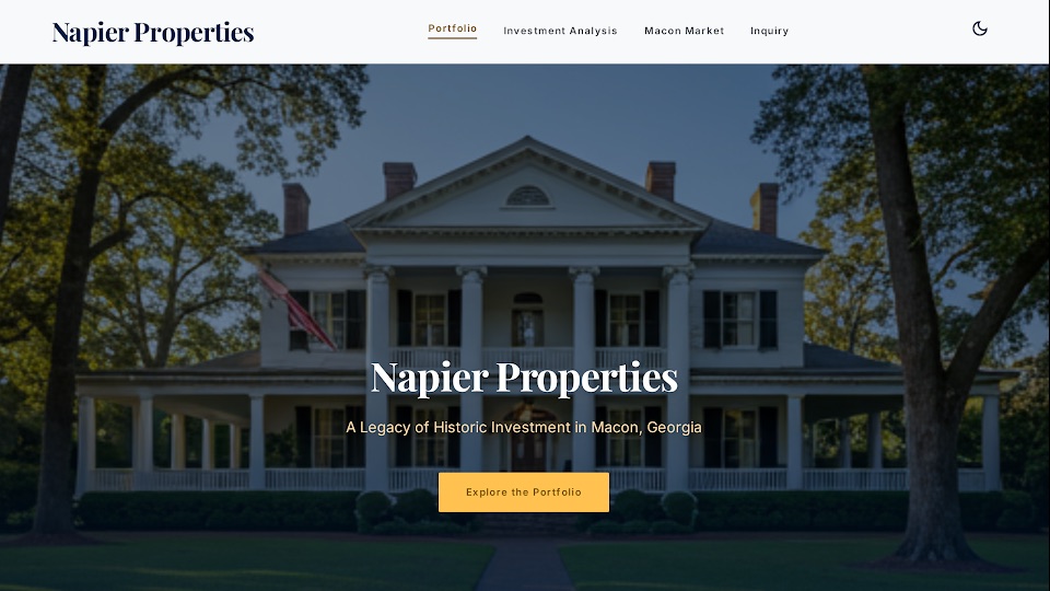 Napier Properties home page: a white columned historic house at dusk under the title Napier Properties, A Legacy of Historic Investment in Macon, Georgia.